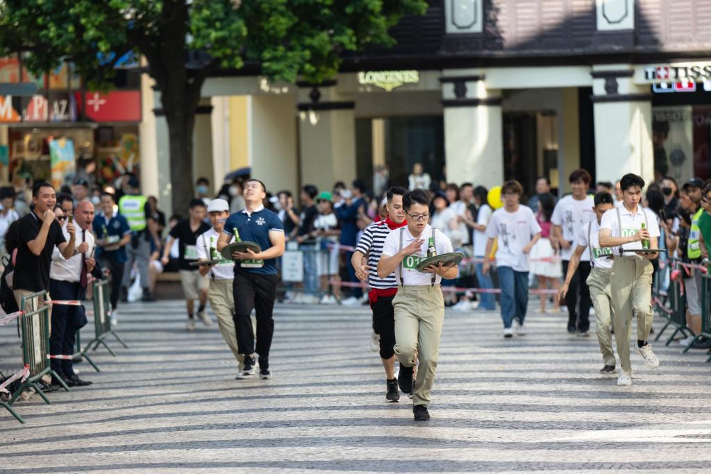 世界旅游日：澳门旅游局举办托盘比赛